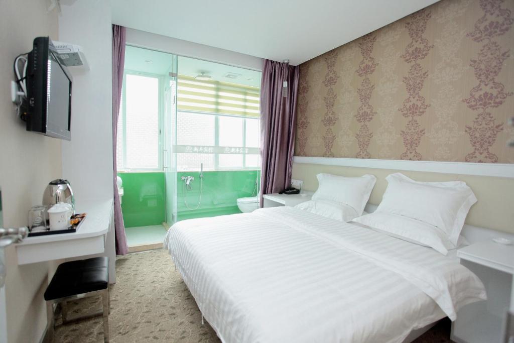 Xinghe Xinfeng Hotel Гуанчжоу Номер фото