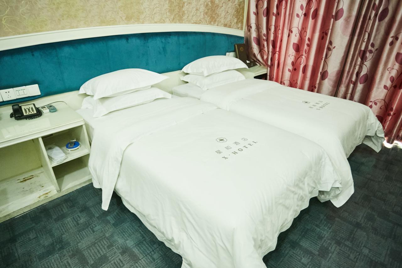 Xinghe Xinfeng Hotel Гуанчжоу Экстерьер фото